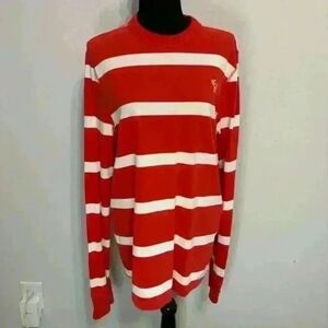 Muscle fitting long sleeved shirt with red and white stripes